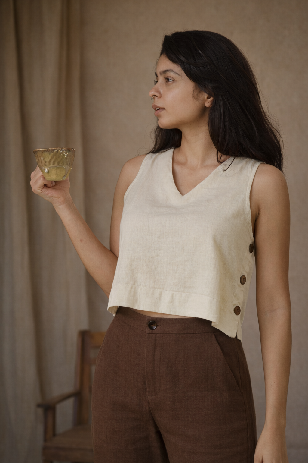 "Dheemi Lau" - Crop top with button accents