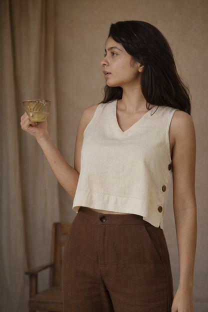 "Dheemi Lau" - Crop top with button accents