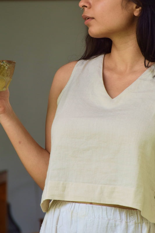 "Dheemi Lau" - Beige Sleeveless Cotton Top Side Button Detailed