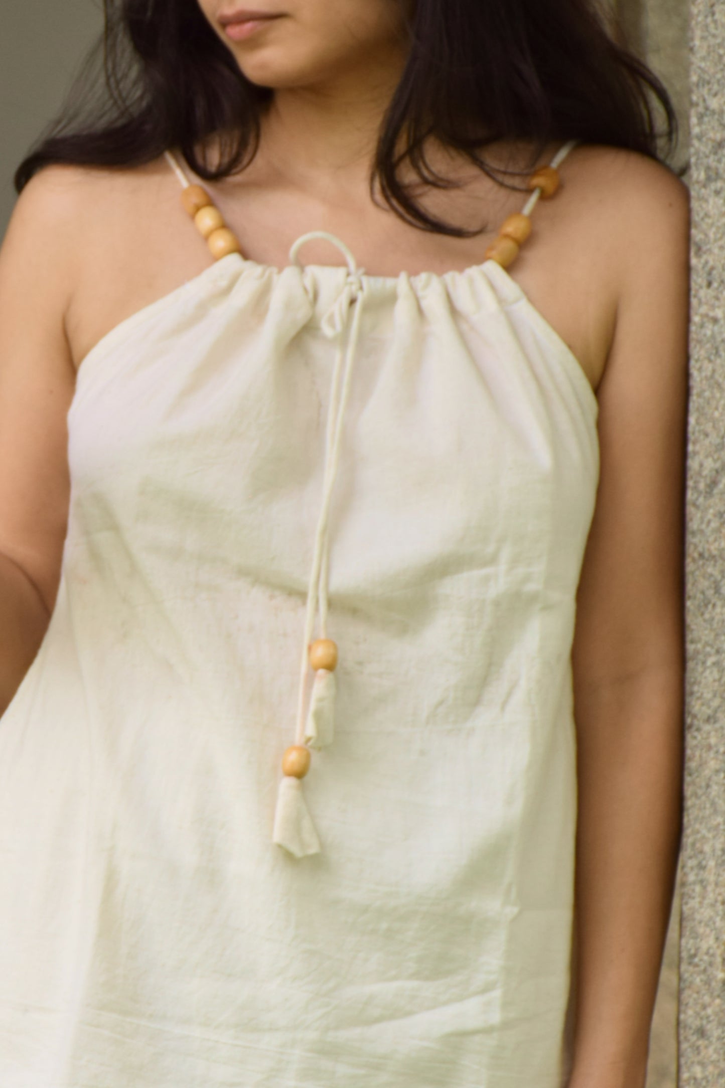 "Lehrati Baat" - Beige cotton adjustable neckline top with natural wooden beads