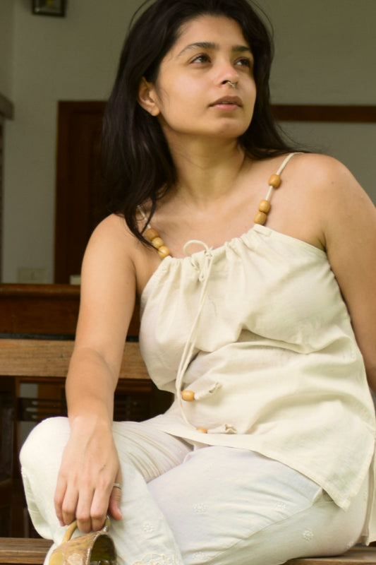 "Lehrati Baat" - Beige cotton adjustable neckline top with natural wooden beads