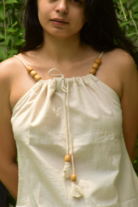 "Lehrati Baat" - Beige cotton adjustable neckline top with natural wooden beads